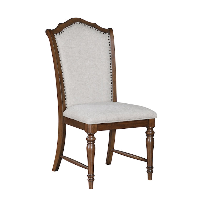 Wooden chair with upholstered seat and backrest on a white background