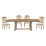 Wooden dining table with four matching chairs on a white background
