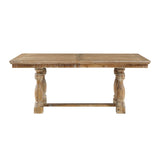 Wooden dining table with turned legs on a white background
