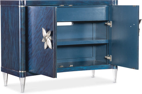 Hooker Furniture Melange Sapphire Accent Chest – Sapphire Blue Finish, Acrylic Legs, Silver Floral Hardware - sold by Home Elegance USA