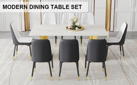 Table and chair set.The table has a glass top with imitation marble pattern stickers and stainless steel golden legs. Paried with 8 White and Dark Gray Spliced Color PU Dining Chairs.W1151S01559 - sold by Home Elegance USA