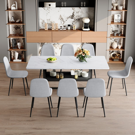 Table and chair set.71*35.4 inch White Grain Spliced Dining Table With Storage Function In The Middle Of The Table Legs.Paired with 8 Light Gray Linen-Cotton Material High Resilience Dining Chairs. - sold by Home Elegance USA