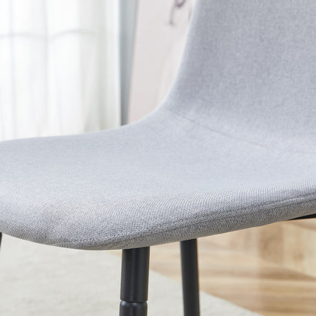 Table and chair set.71*35.4 inch White Grain Spliced Dining Table With Storage Function In The Middle Of The Table Legs.Paired with 8 Light Gray Linen-Cotton Material High Resilience Dining Chairs. - sold by Home Elegance USA