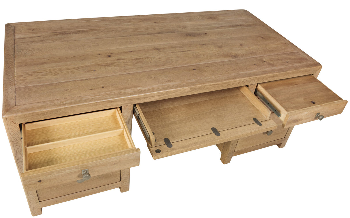 Wooden desk with multiple drawers on a white background
