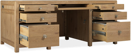 Wooden desk with multiple drawers on a white background