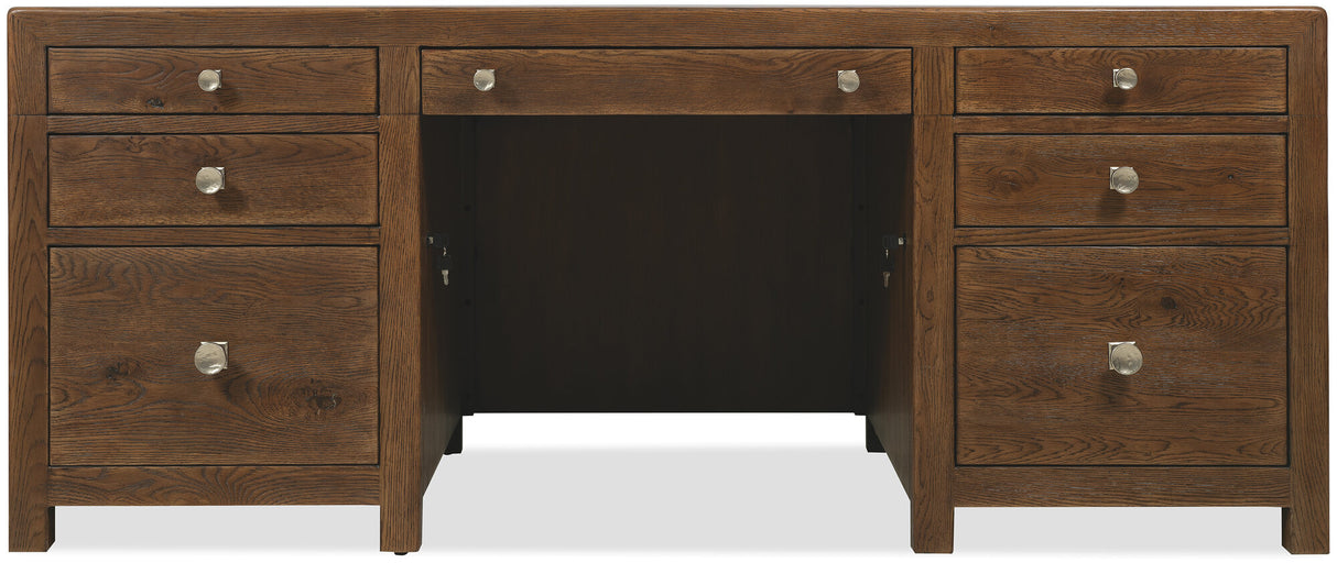 Wooden desk with multiple drawers on a white background