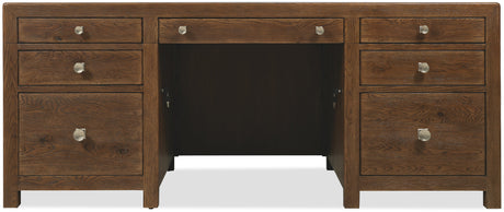 Wooden desk with multiple drawers on a white background
