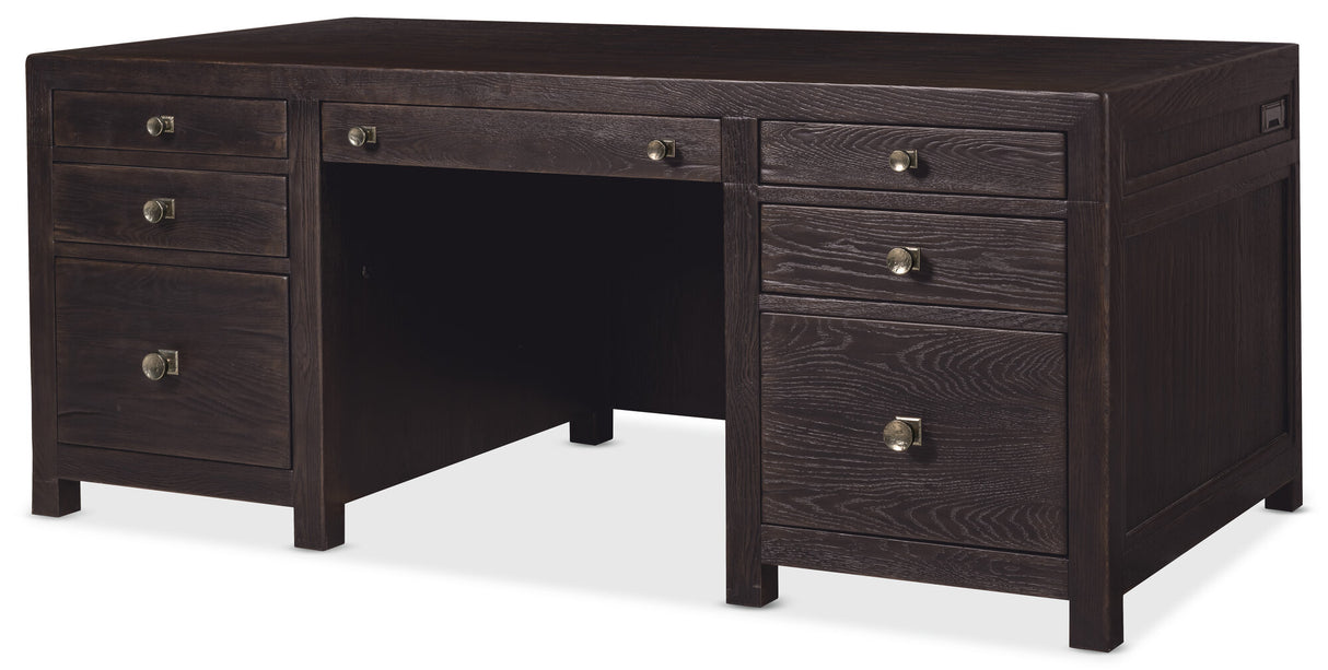 Dark wood desk with multiple drawers on a white background