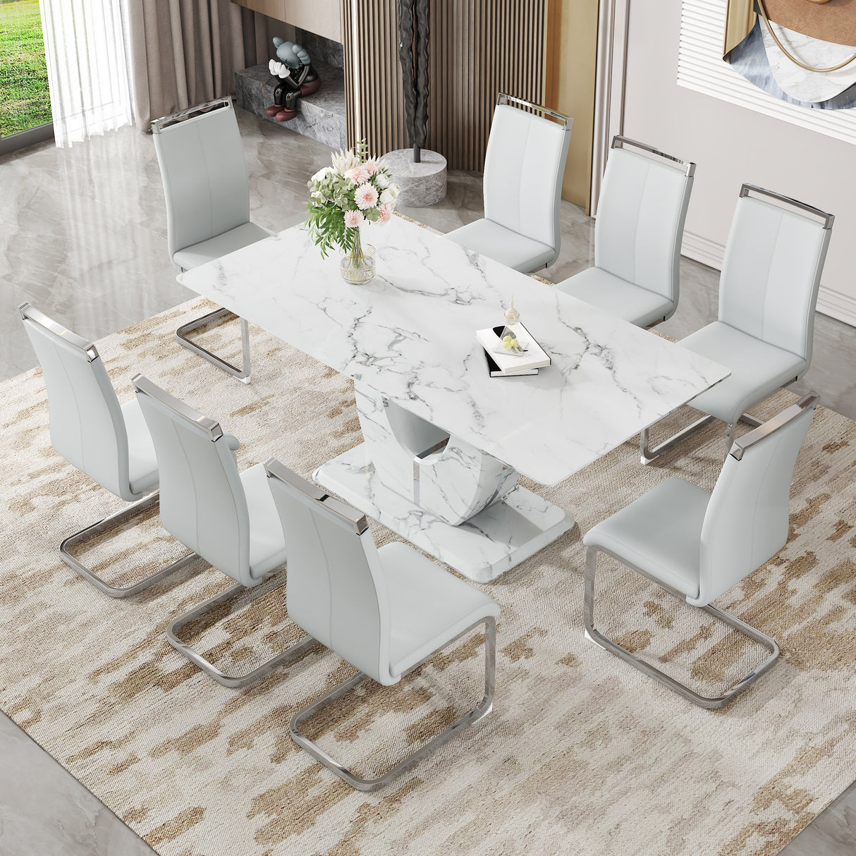 Juego de mesa y sillas. Juego de comedor moderno con diseño de mármol simple: mesa de 71'x35.4' con 8 sillas de PU gris claro. Adhesivo con diseño de mármol blanco, tablero de vidrio templado, con patas de silla de metal plateado arqueadas.