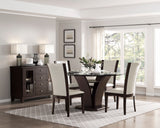 Dining room with a dark wood table and chairs, sideboard, and large window.