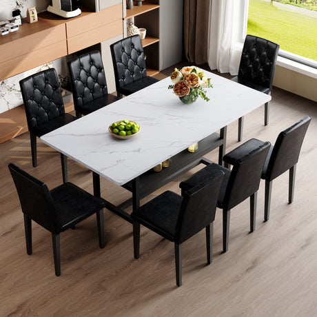 Table and chair set.71*35.4 inch White Grain Spliced Dining Table With Storage Function In The Middle Of The Table Legs.Paired with 8 black PU dining chairs with ergonomic buckle backrest. - sold by Home Elegance USA