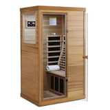 Sauna interior de infrarrojos lejanos para una persona en minicedro rojo con puerta de cristal a la izquierda, madera natural y caramelo