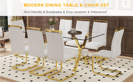 Table and chair set.Elegant Transparent Tempered Glass Dining Set - 71'x35.4' with 8 White PU Chairs with golden C-tube metal leg. - sold by Home Elegance USA