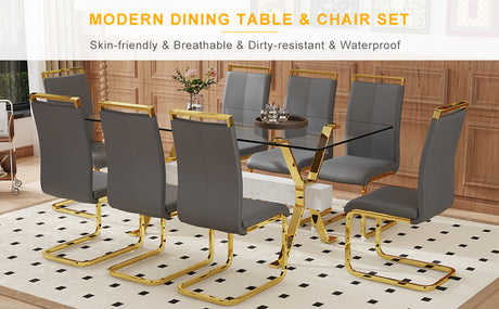 Table and chair set.Elegant Transparent Tempered Glass Dining Set - 71'x35.4' with 8 Dark Gray PU Chairs with golden C-tube metal leg. - sold by Home Elegance USA