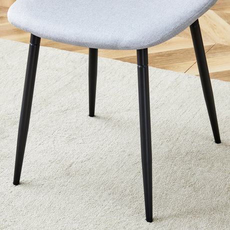 Table and chair set.71*35.4 inch White Grain Spliced Dining Table With Storage Function In The Middle Of The Table Legs.Paired with 8 Light Gray Linen-Cotton Material High Resilience Dining Chairs. - sold by Home Elegance USA