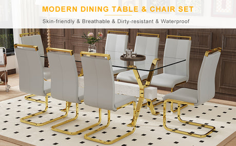 Table and chair set.Elegant Transparent Tempered Glass Dining Set - 71'x35.4' with 8 Light Gray PU Chairs with golden C-tube metal leg. - sold by Home Elegance USA