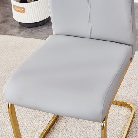 Table and chair set.Elegant Transparent Tempered Glass Dining Set - 71'x35.4' with 8 Light Gray PU Chairs with golden C-tube metal leg. - sold by Home Elegance USA