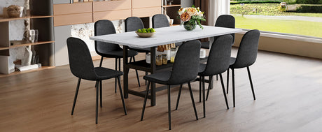 Table and chair set.71*35.4 inch White Grain Spliced Dining Table With Storage Function In The Middle Of The Table Legs.Paired with 8 Black Linen-Cotton Material High Resilience Dining Chair. - sold by Home Elegance USA
