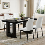Juego de mesa y sillas. Elegante mesa de comedor de madera negra texturizada de 163 x 90 cm. Incluye 4 sillas de comedor de poliuretano blanco y negro con diseño de concha. Irradia un estilo moderno.