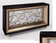 Decorative wall art piece with intricate design in a black and gold frame on a white background