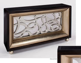 Decorative wall art piece with intricate design in a black and gold frame on a white background
