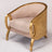 Chair with gold frame and beige cushion on a light gray background