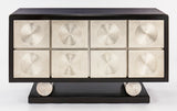 Decorative console table with circular patterns on a white background