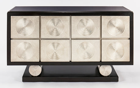 Decorative console table with circular patterns on a white background