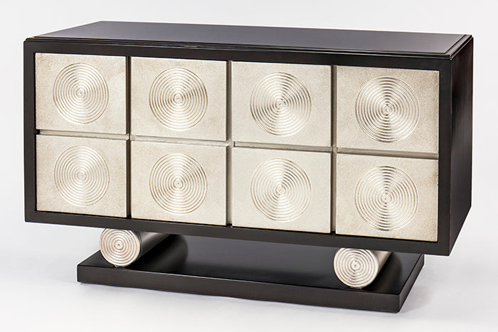 Decorative cabinet with circular patterns on a white background