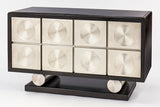 Decorative cabinet with circular patterns on a white background
