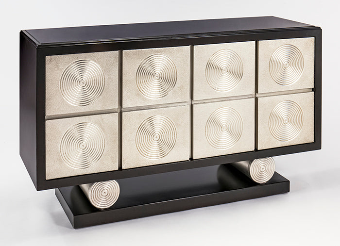 Decorative cabinet with circular patterns on a white background