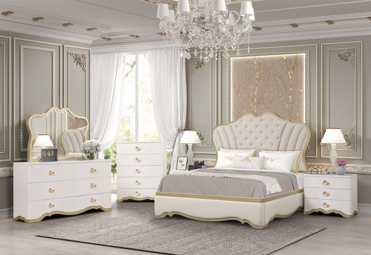 Luxurious bedroom with Ivory furniture, including a bed, dresser, and nightstands, in a stylishly decorated room.