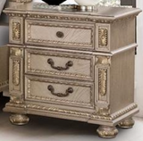 Carolina Nightstand by Cosmos Furniture in gold finish with carved details.