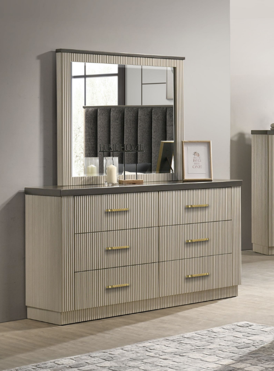 Dresser with mirror and decorative items in a room setting