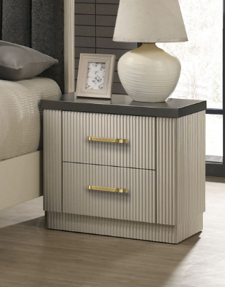 Nightstand with two drawers, a lamp, and a photo frame in a bedroom setting.