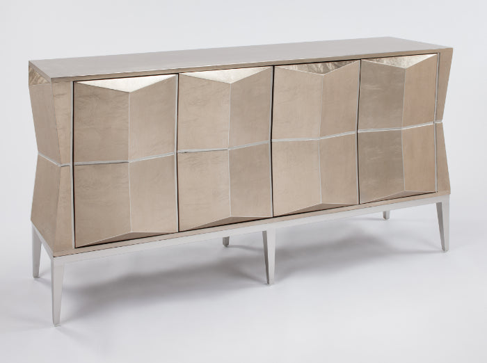 Modern console table with reflective surface on a white background