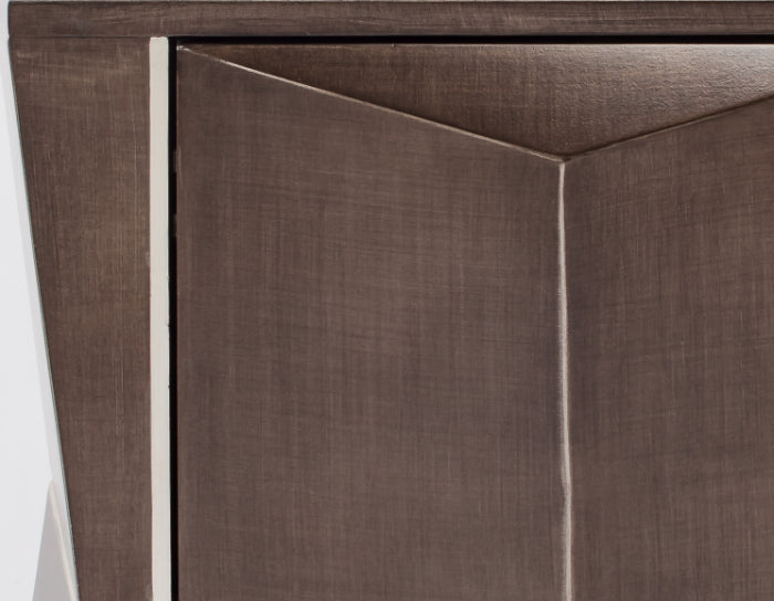 Close-up of a brown wooden cabinet with a white background
