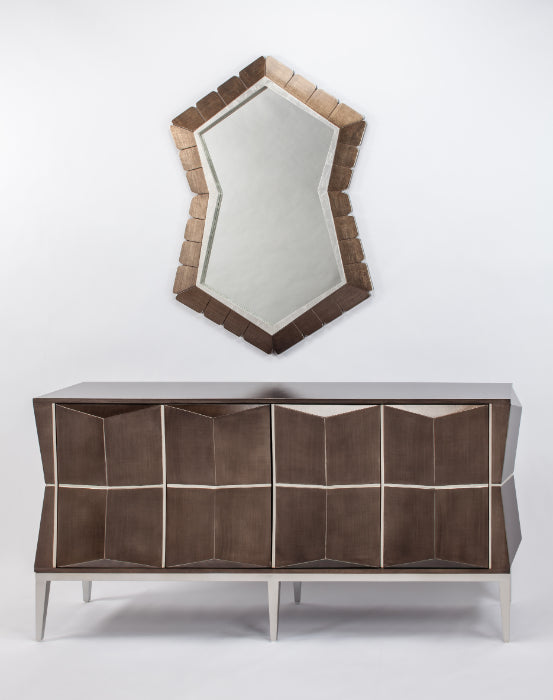 Modern console table with geometric design and matching mirror on a white background