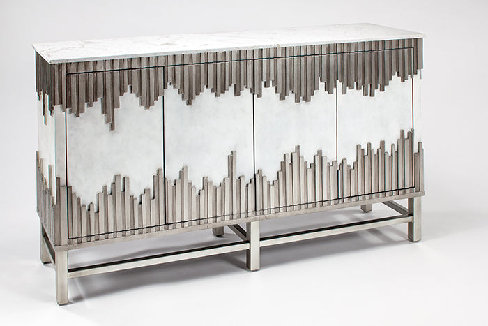 Modern console table with decorative metal base on a white background
