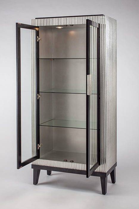 Decorative cabinet with open glass doors on a white background