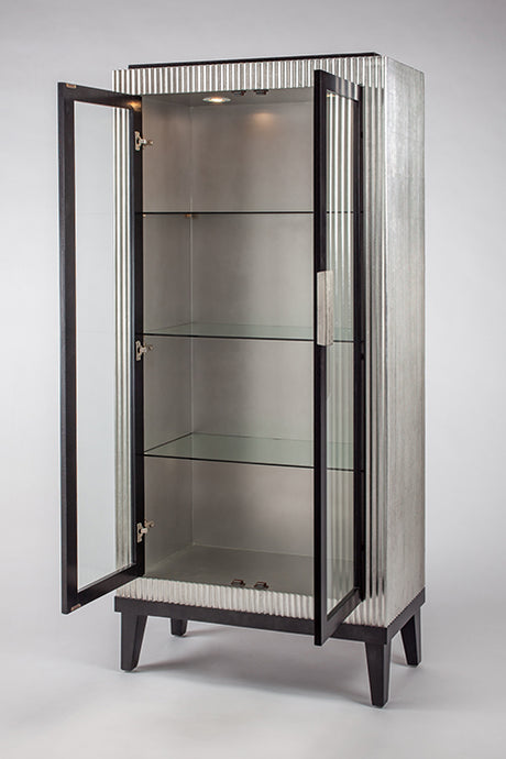 Decorative cabinet with open glass doors on a white background