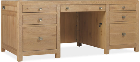 Wooden desk with multiple drawers on a white background