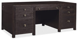 Dark wood L-shaped desk with multiple drawers on a white background