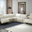 Modern white sectional sofa in a stylish living room with large windows and a hallway | Home Elegance USA