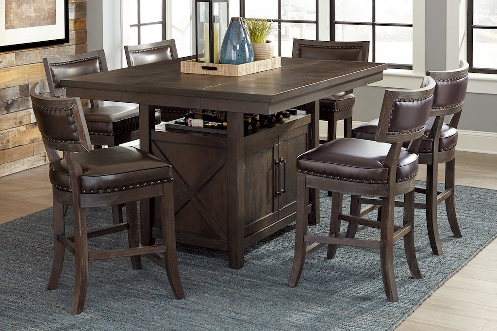 Wooden dining table with six bar stools in a room with large windows.