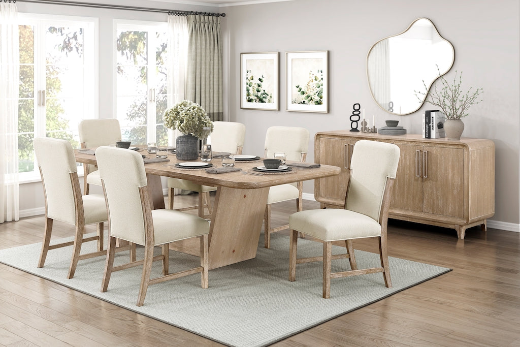 Dining room with wooden table and chairs, sideboard, and decorative elements.