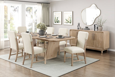 Dining room with wooden table and chairs, sideboard, and decorative elements.