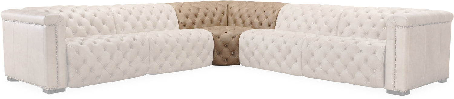 Sectional sofa with tufted genuine leather design in brown color.