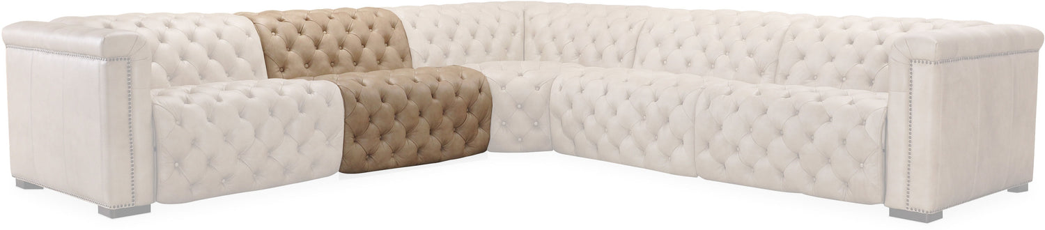 Sectional sofa with tufted genuine leather design in brown color.