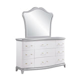 Nina Dresser & Mirror by Cosmos Furniture with tufted high-back bed in white and silver.